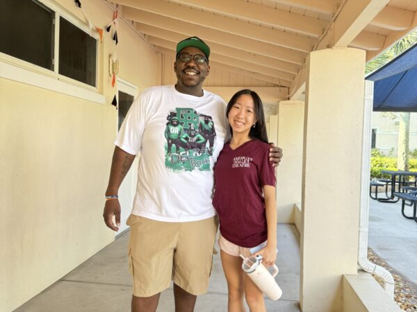 Hannah with community member
